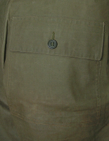 Rear pocket and reach through slit detail.