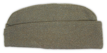 Left side of the enlisted man's garrison cap. The olive‐drab wool fabric used in construction had a raised nap. Just like its American counterpart, the cap had curved peaks, a turned‐up curtain that crossed in the front, and a center gusset. Left side of the enlisted man's garrison cap. The olive‐drab wool fabric used in construction had a raised nap. Just like its American counterpart, the cap had curved peaks, a turned‐up curtain that crossed in the front, and a center gusset.
