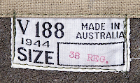 Close‐up view of manufacturer's label located inside of the wool jacket. This particular jacket was made in the state of Victoria in 1944. Reverse Lend Lease garments displayed U.S. size markings. Close‐up view of manufacturer's label located inside of the wool jacket. This particular jacket was made in the state of Victoria in 1944. Reverse Lend Lease garments displayed U.S. size markings.