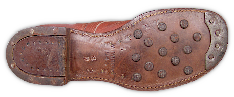 The full leather outsole of the Australian made hobnail service shoes showing the hobnails, steel rimmed heel, and steel toe tap. Regular service shoes were also made in Australia during WW2 as part of the reverse lend lease program. The full leather outsole of the Australian made hobnail service shoes showing the hobnails, steel rimmed heel, and steel toe tap. Regular service shoes were also made in Australia during WW2 as part of the reverse lend lease program.