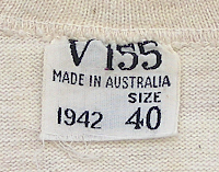 Label attached to the inside collar of the Australian made wool blend undershirt shown left. This particular example was made in the state of Victoria in 1942. Label attached to the inside collar of the Australian made wool blend undershirt shown left. This particular example was made in the state of Victoria in 1942.