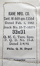 Contractor's label for the khaki trouser to the immediate left. Kane Manufacturing Co. of Louisville, KY made trousers for the US Army throughout the WW2 period. Specification PQD 19A involved alternate construction methods that enabled a greater number of manufacturers to produce trousers for the war effort. Contractor's label for the khaki trouser to the immediate left. Kane Manufacturing Co. of Louisville, KY made trousers for the US Army throughout the WW2 period. Specification PQD 19A involved alternate construction methods that enabled a greater number of manufacturers to produce trousers for the war effort.