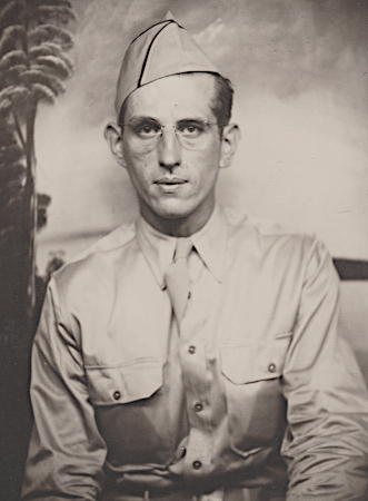 Pvt. John Sabon in Hawaii during 1942. The khaki cotton shirt had mitered pockets and flaps to prevent corners from sticking out. His field cap (a.k.a. garrison cap) is trimmed with scarlet branch of service piping indicating he is assigned to an artillery unit. Pvt. John Sabon in Hawaii during 1942. The khaki cotton shirt had mitered pockets and flaps to prevent corners from sticking out. His field cap (a.k.a. garrison cap) is trimmed with scarlet branch of service piping indicating he is assigned to an artillery unit.