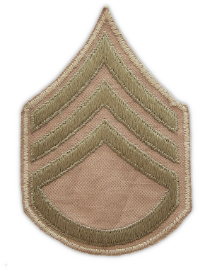 Cotton staff sergeant chevrons (3rd grade). Another type of washable chevron worn on the khaki uniform during the WW2 era. Considered unofficial, this type was made by embroidering olive‐drab chevrons on a khaki cotton twill background. Cotton staff sergeant chevrons (3rd grade). Another type of washable chevron worn on the khaki uniform during the WW2 era. Considered unofficial, this type was made by embroidering olive‐drab chevrons on a khaki cotton twill background.