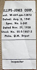 Contractor's label for the khaki cotton shirt shown to the right. Labels were located on the inside of the right, rear shirt tail. Phillips‐Jones Corp. of Barnesboro, PA. was a primary shirt contractor for the Army throughout WW2. Contract 12872 was issued in August 1941 for $252,000 and completed in February 1942. Contractor's label for the khaki cotton shirt shown to the right. Labels were located on the inside of the right, rear shirt tail. Phillips‐Jones Corp. of Barnesboro, PA. was a primary shirt contractor for the Army throughout WW2. Contract 12872 was issued in August 1941 for $252,000 and completed in February 1942.