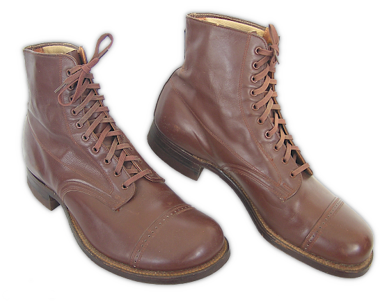 Garrison Shoes (specification QMC 9‐35A, 1933). Though similar looking to standard high‐top service shoes, garrison shoes were lined with cotton and built for comfort instead of marching. They were made with calfskin uppers making them much softer and easier to break in. The tan low‐quarter shoe, a restricted issue shoe for much of the war, began to replace this shoe in 1941. Garrison Shoes (specification QMC 9‐35A, 1933). Though similar looking to standard high‐top service shoes, garrison shoes were lined with cotton and built for comfort instead of marching. They were made with calfskin uppers making them much softer and easier to break in. The tan low‐quarter shoe, a restricted issue shoe for much of the war, began to replace this shoe in 1941.