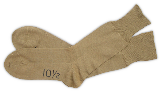 Tan cotton socks (federal specification JJ‐S‐566A, 26 August 1938). These socks were authorized for wear with the khaki cotton uniform. Though worn with standard service shoes, garrison shoes, and low quarter shoes, tan cotton socks were primarily a dress item and therefore not appropriate for marching or field use. Light wool socks in white or olive‐drab shade were also worn with the khaki uniform. Tan cotton socks (federal specification JJ‐S‐566A, 26 August 1938). These socks were authorized for wear with the khaki cotton uniform. Though worn with standard service shoes, garrison shoes, and low quarter shoes, tan cotton socks were primarily a dress item and therefore not appropriate for marching or field use. Light wool socks in white or olive‐drab shade were also worn with the khaki uniform.