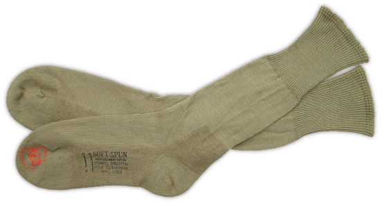 Olive‐drab cushion sole socks (specification PQD 236, August 1942). In 1942, socks comprised of a 50% wool and 50% cotton blend were introduced that featured a cushion sole designed to keep the feet dry and comfortable while in the field. Initially, cushion sole socks were made in both olive‐drab and gray, but by 1943 were predominately olive‐drab. Cushion sole socks became standard issue for all branches of service during WW2 and underwent continual improvements in material composition, water repellency, and shrink resistance. Olive‐drab cushion sole socks (specification PQD 236, August 1942). In 1942, socks comprised of a 50% wool and 50% cotton blend were introduced that featured a cushion sole designed to keep the feet dry and comfortable while in the field. Initially, cushion sole socks were made in both olive‐drab and gray, but by 1943 were predominately olive‐drab. Cushion sole socks became standard issue for all branches of service during WW2 and underwent continual improvements in material composition, water repellency, and shrink resistance.