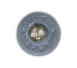 Close‐up view of the trouser waistband button. Pre‐war khaki trousers had dished buttons made from zinc and were stamped "U.S. Army" on the front. There was one 27‐ligne waistband button and four 22‐ligne fly buttons. Beginning in 1942, buttons for khaki trousers were made of plastic. Close‐up view of the trouser waistband button. Pre‐war khaki trousers had dished buttons made from zinc and were stamped "U.S. Army" on the front. There was one 27‐ligne waistband button and four 22‐ligne fly buttons. Beginning in 1942, buttons for khaki trousers were made of plastic.