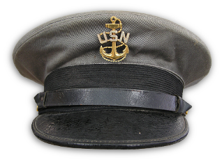 Front view of Chief Petty Officer's combination cap with gray cover.