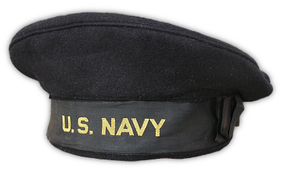 The Blue Cloth Cap was a beret style cap made out of 16-ounce dark blue Melton wool.  It had a silk ribbon around the band embroidered with "U.S. NAVY" in block letters.  On the left side of the cap there was a silk bow tacked over where the ribbon joined together.  When the cap was worn with the dress blue jumper and blue trousers, the uniform was designated Dress, Blue, A.