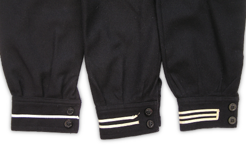 The WW2 dress blue jumper had either one, two, or three cuff stripes made of 3/16-inch-wide white tape. Apprentice Seamen wore one white stripe; Seamen Second class and Firemen Second Class wore two white stripes; Seamen and Firemen First Class and Petty Officers 1st, 2nd, and 3rd class wore three white stripes.   By 1944, one stripe jumpers were no longer produced in order to ease supply problems.