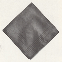 This illustration from the 1941 Navy Uniform Regulations shows the Neckerchief folded.  The four lines along the perimeter were for decorative purposes.