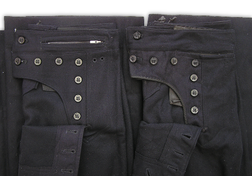 In 1944, the enlisted man's blue trousers went through some changes as well.  This side-by-side comparison of the old trousers (left) and the new trousers (right) shows that the pockets were moved from the waistband to just below the waistband and that the eyelets for the laundry ties were removed from the hips.