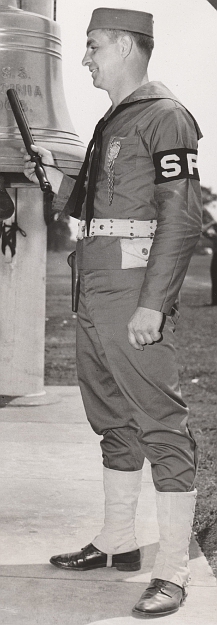 David B. Bayse Sp. 1/C of Roanoke, Va. sports the new gray uniform of the Permanent Shore patrol in this May 1944 photo taken in Norfolk, Va.
