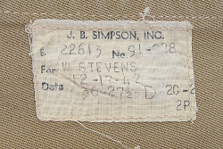 Close-up of manufacturer's label found inside khaki aviation coat below.