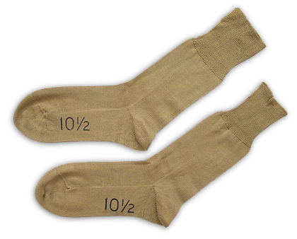 Tan cotton socks.  Brown or tan socks were required when brown shoes were worn with the khaki uniform.