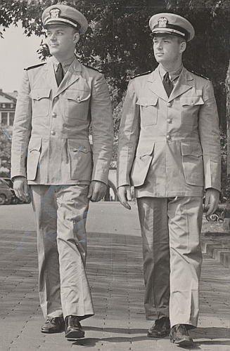 Ensigns Fredrick L. Zimmerman and Joseph T. Weyrough model the Navy's new khaki uniform in a publicity photo taken in September 1941 at the Washington Navy Yard. The new design and roll-out was for all commissioned officers whereas the previous khaki uniform had only been worn by naval aviators.