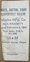 Contractor's label for the Army type convertible collar khaki cotton shirt procured by the Brooklyn Naval Depot.  The Navy procured tens of thousands of this kind of shirt during WW2. This contract was awarded to Reliance Manufacturing on 2 February 1943 and was for $139,000 worth of shirts.