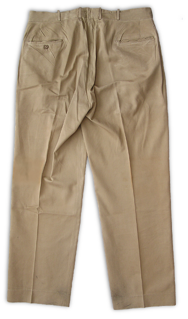 Back view of US Navy khaki cotton working trousers. The trousers had a roomy seat that allowed easy bending and squatting. The left, rear pocket had a single button-through closure.